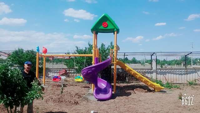 Kids garden store swing and slide